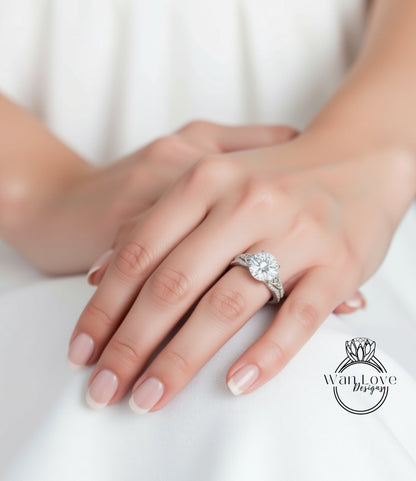 A close-up of a person's hand wearing a large diamond engagement ring.