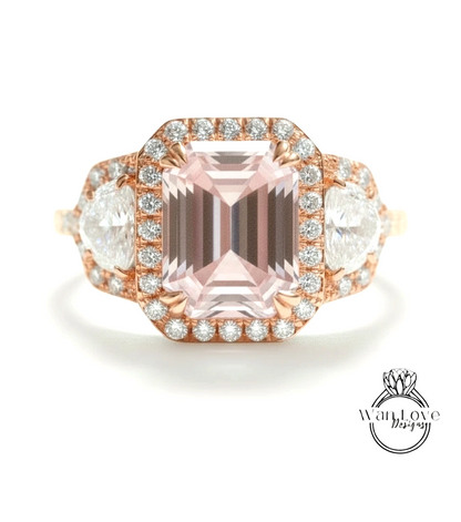 A beautiful engagement ring with a large pink gemstone surrounded by smaller diamonds and set in a rose gold band.