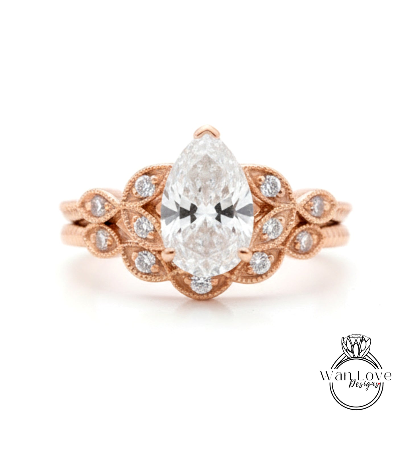 a beautiful engagement ring with a large central diamond surrounded by smaller diamonds on either side, set in a rose gold band.