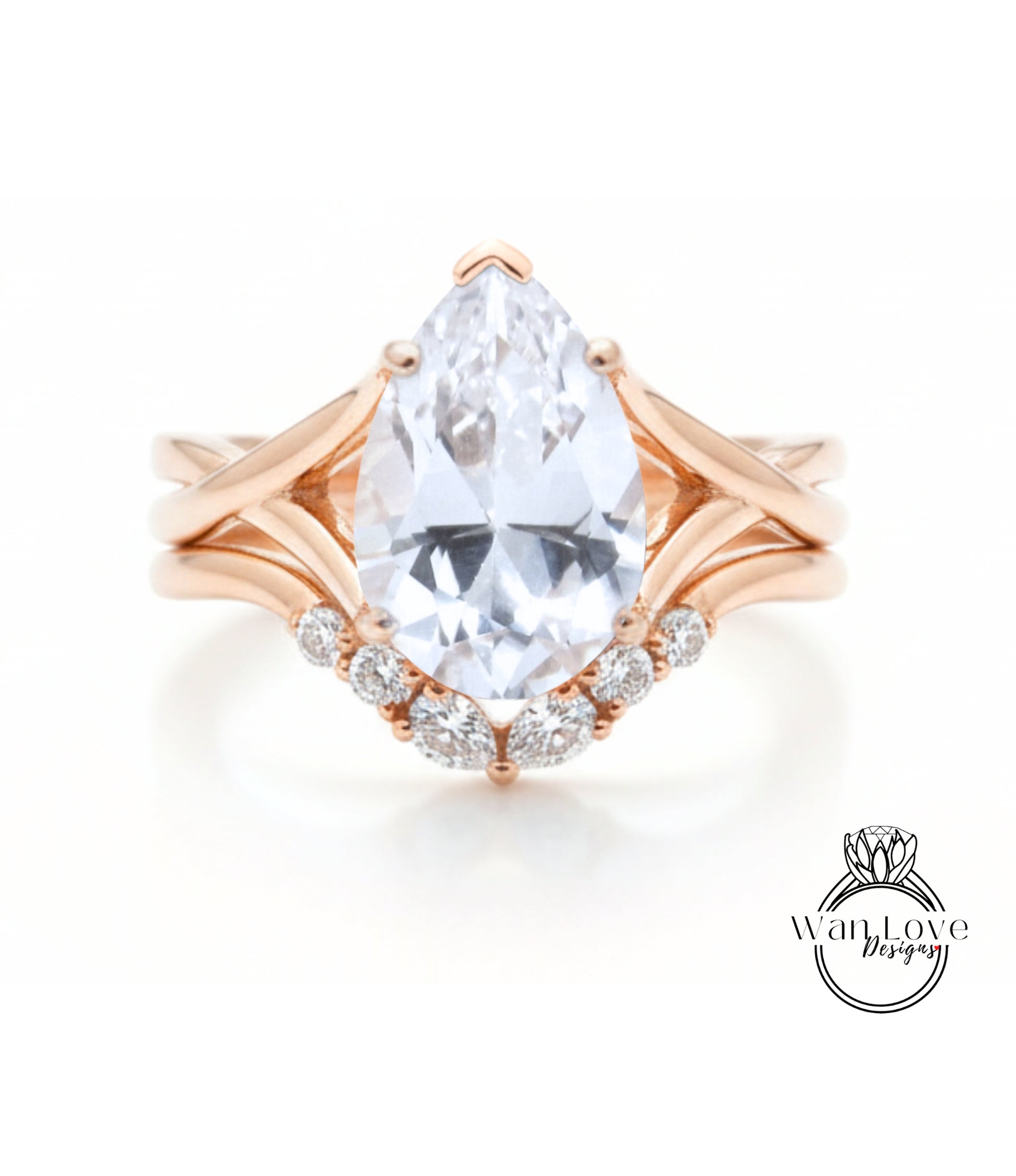 a beautiful engagement ring with a large pear-shaped diamond set in a rose gold band.