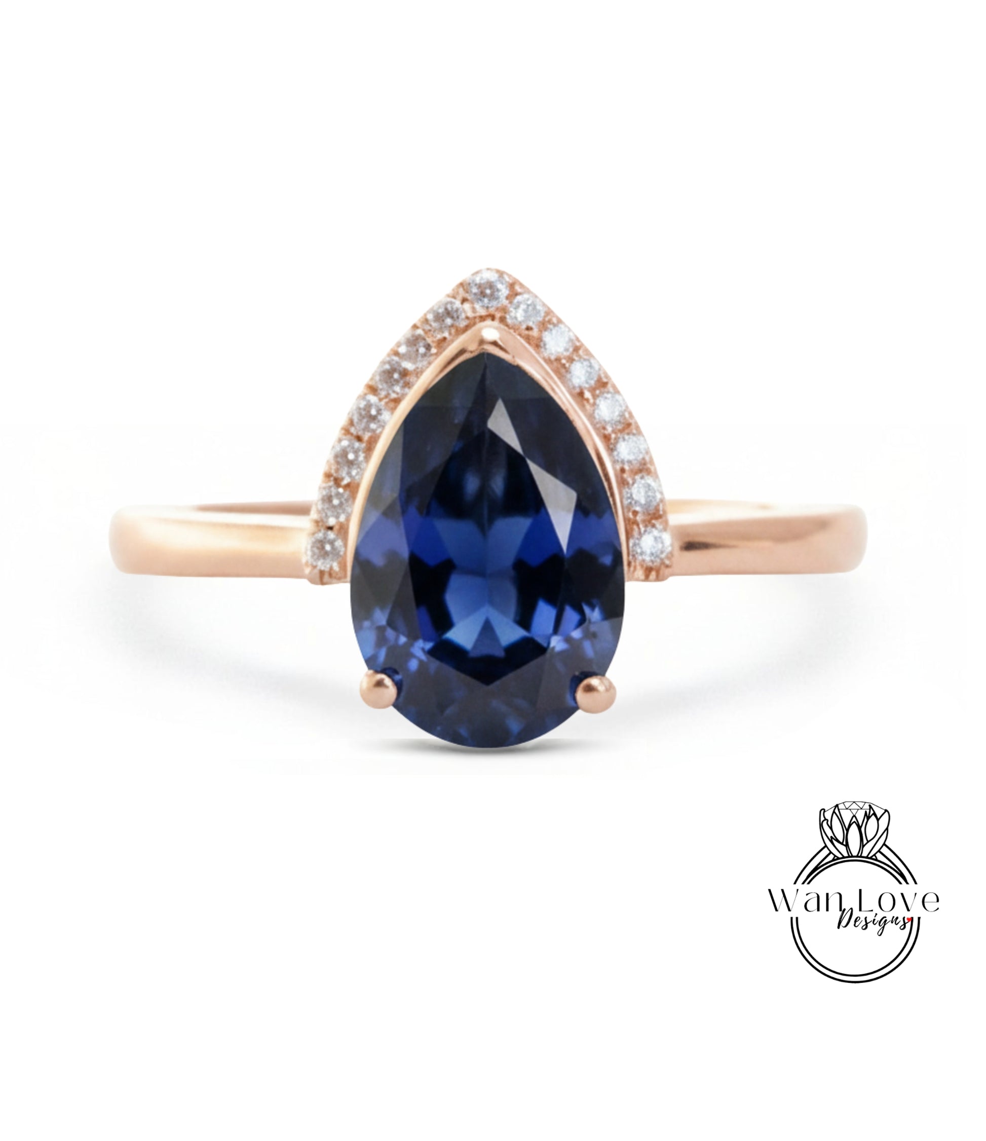 A gold ring with a large blue gemstone, possibly a sapphire, set in the center.