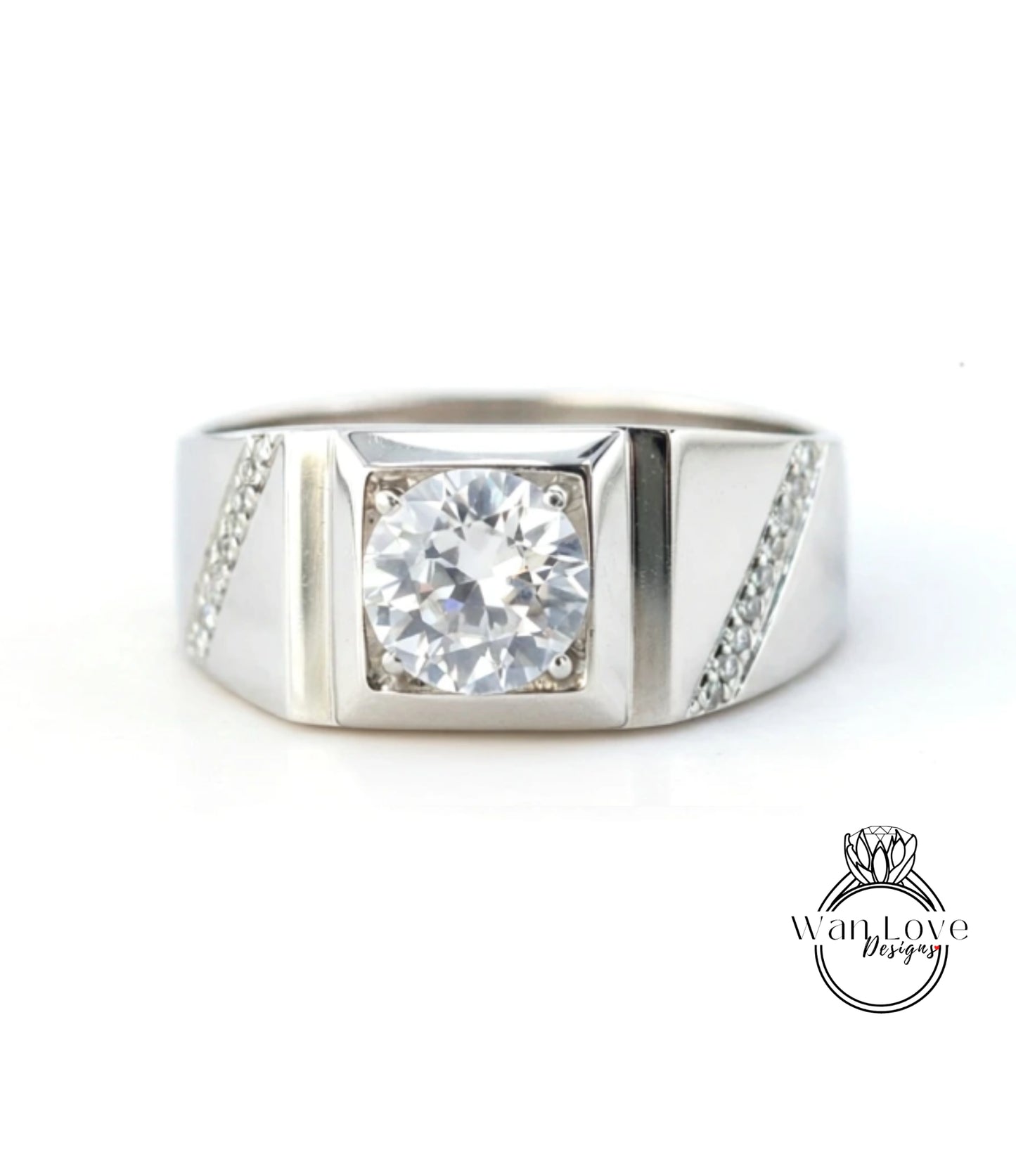 A silver ring with a large, clear gemstone set in the center.