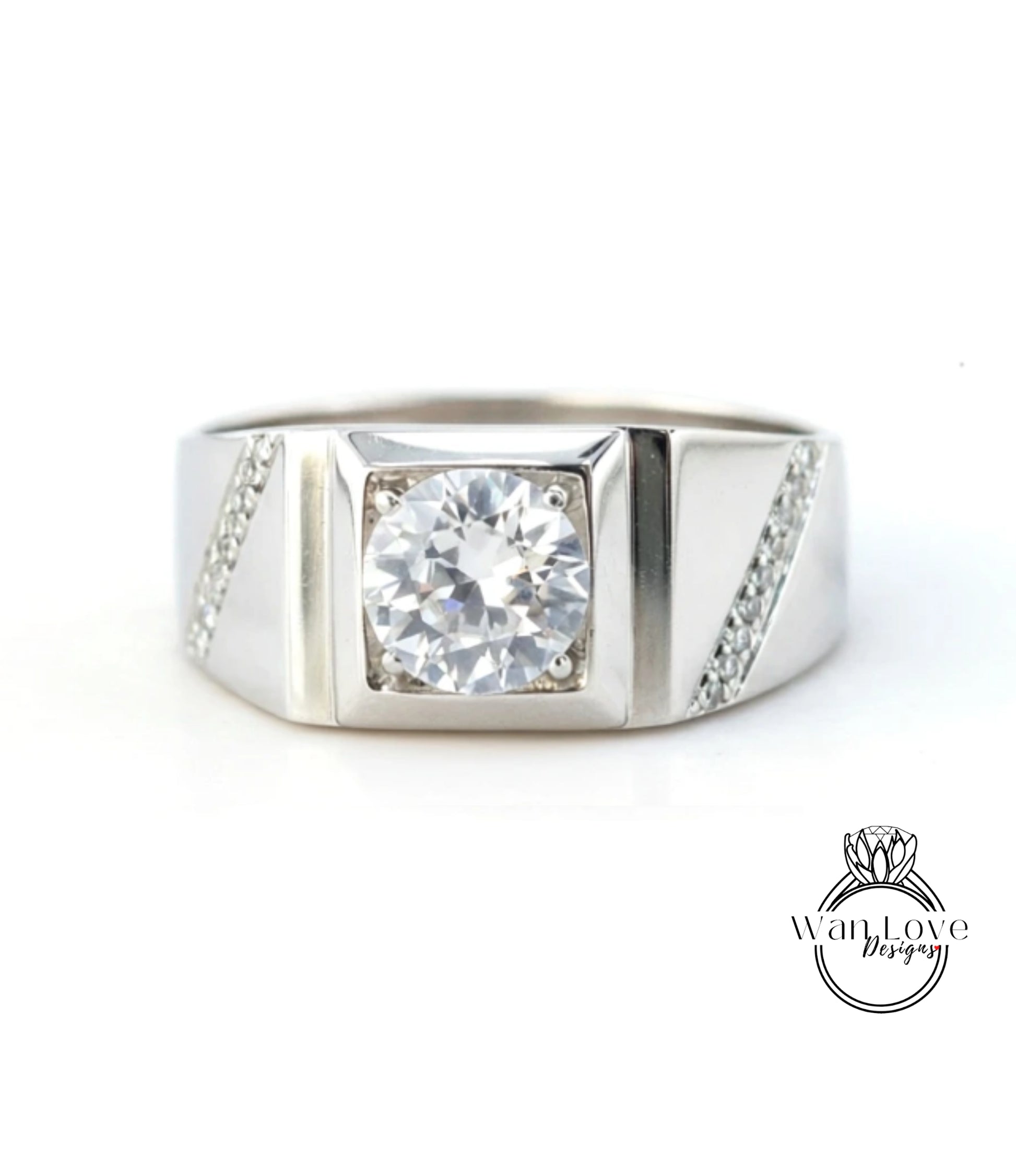 A silver ring with a large, clear gemstone set in the center.