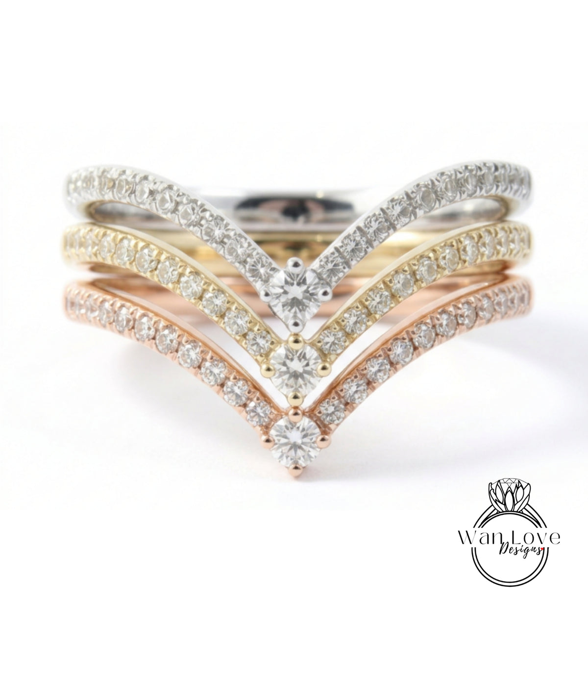 A ring with a diamond band and multiple diamond-encrusted bands, showcasing a variety of colors and designs.