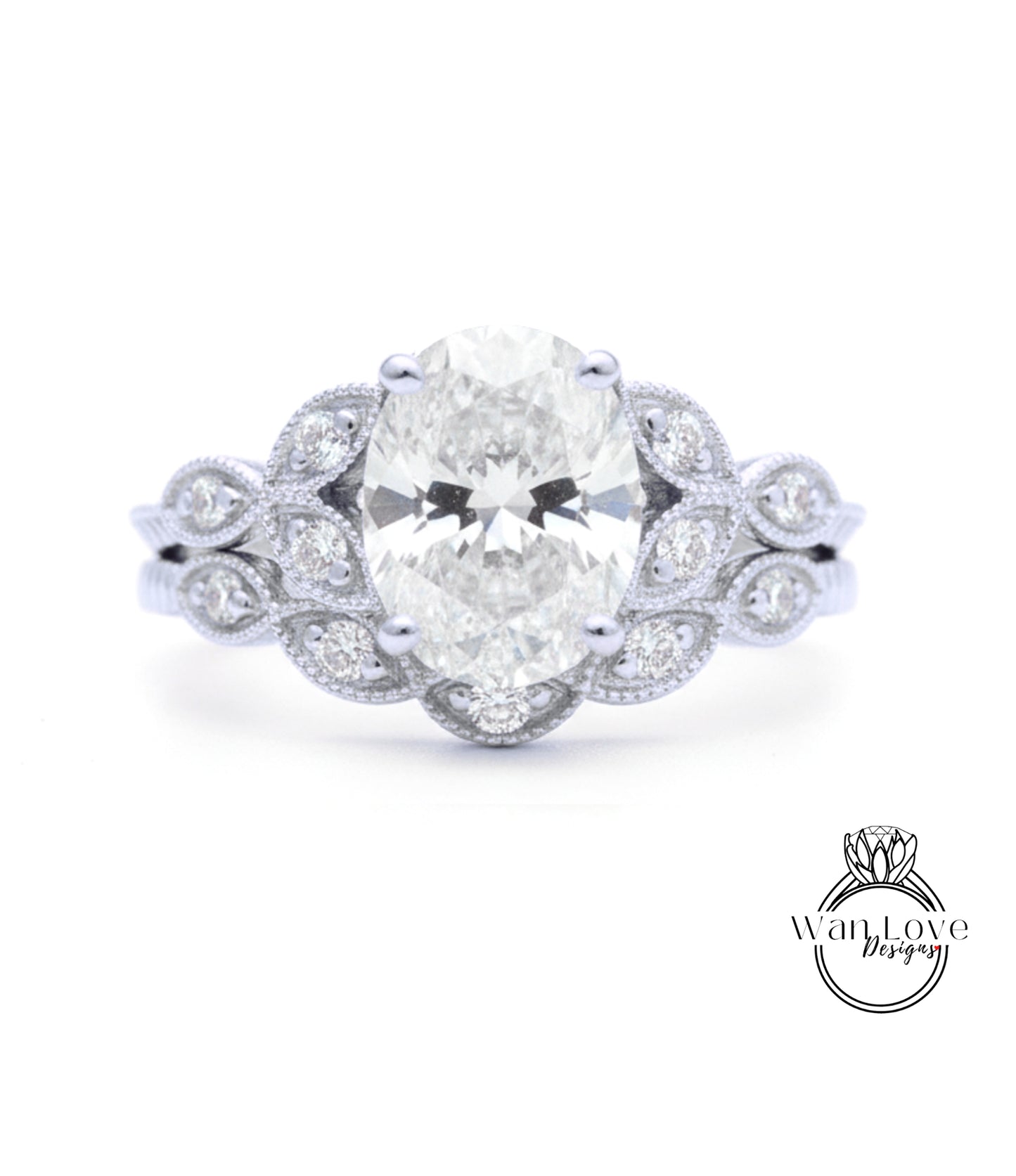 A close-up of a diamond engagement ring with a large oval-shaped diamond surrounded by smaller diamonds and a floral-inspired design.