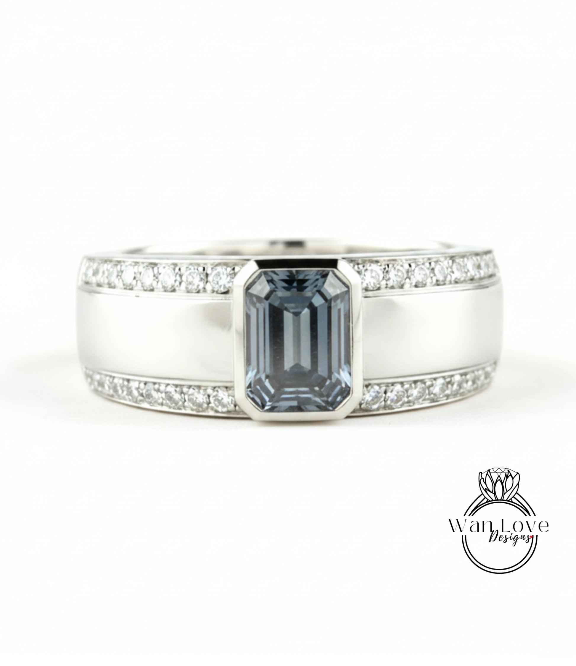 A silver ring with a large blue gemstone in the center, surrounded by smaller diamonds.