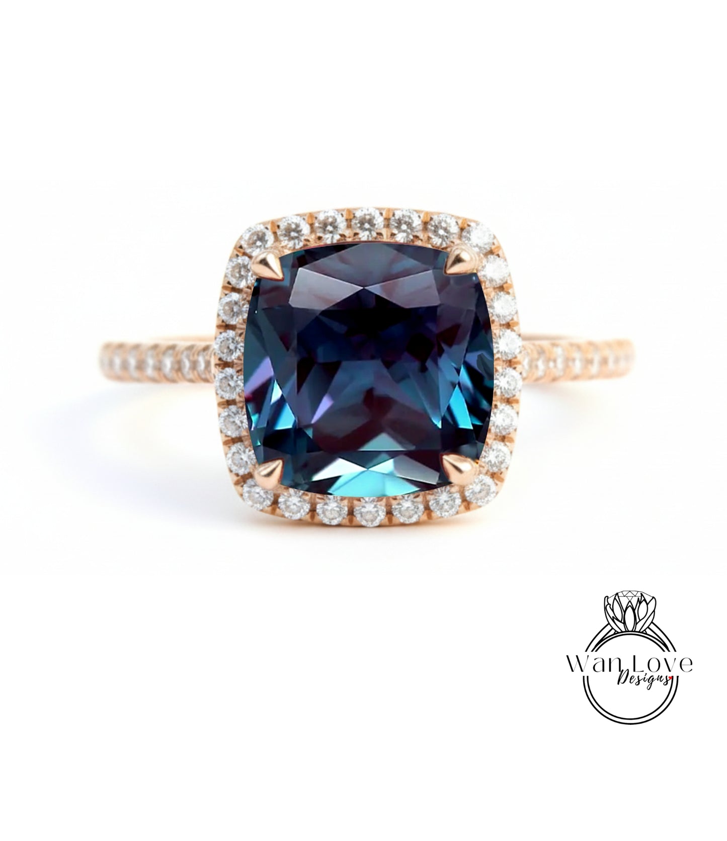 A large, blue gemstone ring with a halo of smaller diamonds around the center stone.