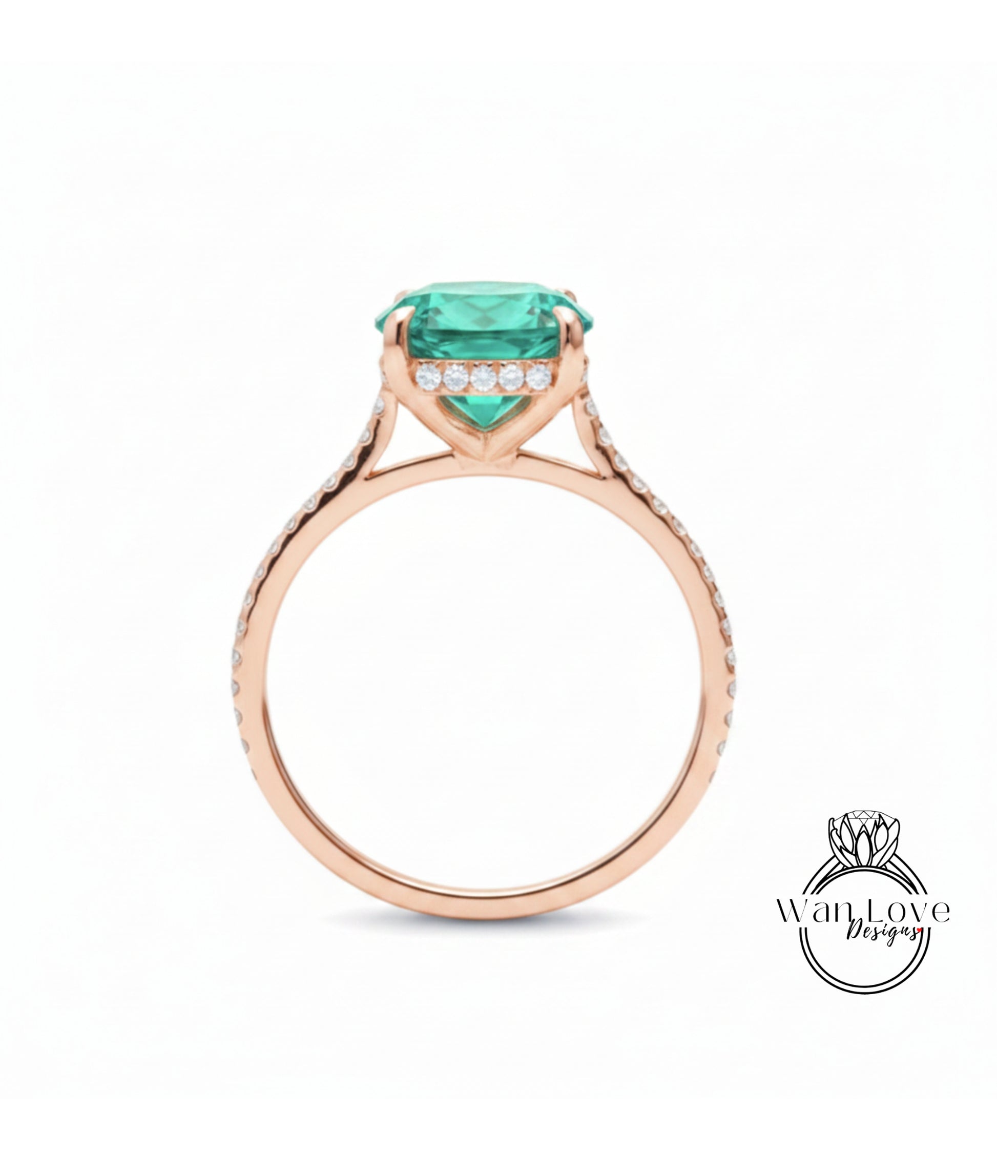 A rose gold engagement ring with a large, vibrant green gemstone set in the center, surrounded by smaller diamonds.