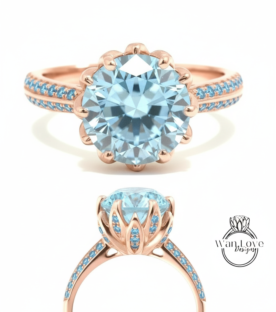 a beautiful blue gemstone ring with a large central stone surrounded by smaller stones. The ring has a rose gold band with blue stones and a delicate flower-like design.