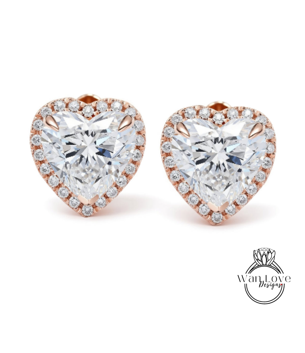 a pair of elegant diamond earrings with a heart-shaped design and a sparkling crystal center.