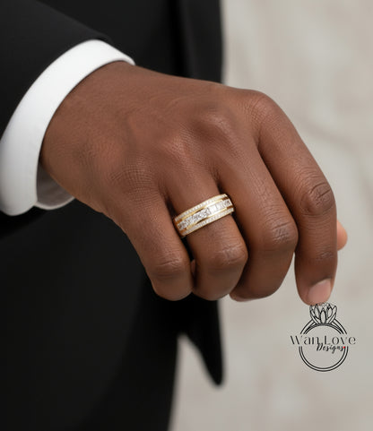 A close-up of a person's hand wearing a gold ring with a diamond band.