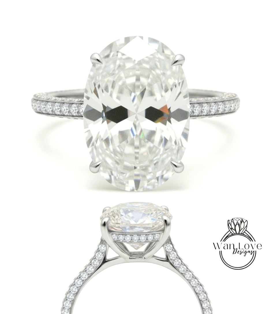 A stunning diamond engagement ring with a large oval-shaped diamond set in a silver band adorned with smaller diamonds.