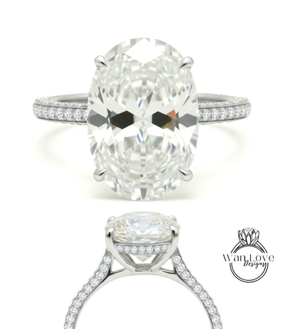 A stunning diamond engagement ring with a large oval-shaped diamond set in a silver band adorned with smaller diamonds.