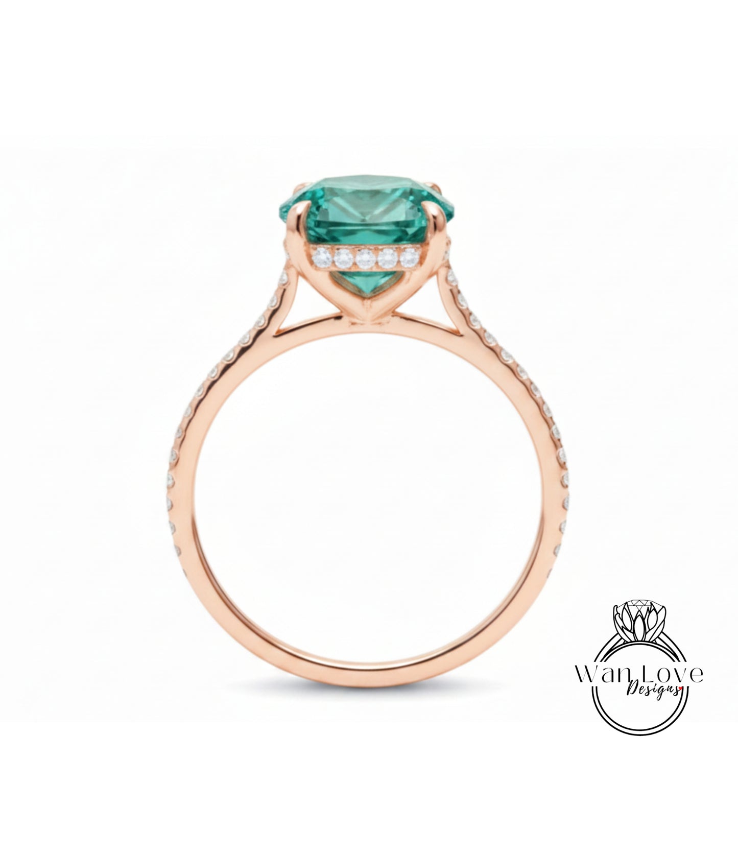 A rose gold engagement ring with a large, round, green gemstone set in the center, surrounded by smaller diamonds.
