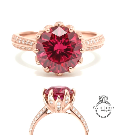 a stunning rose gold ring with a large, vibrant red gemstone at its center. The ring is adorned with small diamonds around the band, adding to its elegance and sophistication. The image showcases the ring from various angles, highlighting its intricate design and the way it catches the light.