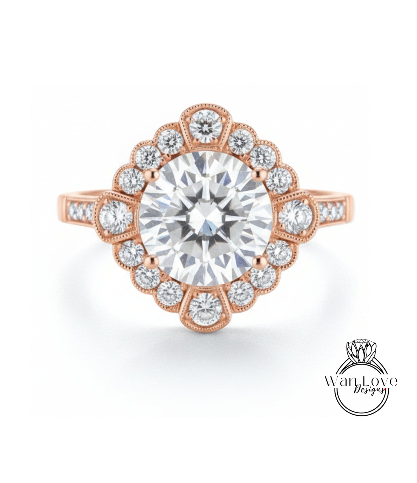 a beautiful engagement ring with a large central diamond surrounded by smaller diamonds arranged in a fan-like pattern.