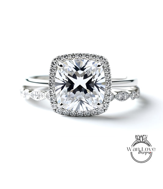 A close-up view of a diamond engagement ring with a large, brilliant-cut diamond set in a halo of smaller diamonds, surrounded by a halo of smaller diamonds.