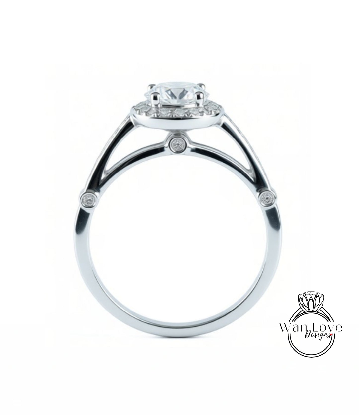 A silver engagement ring with a large central diamond and smaller diamonds around the halo.