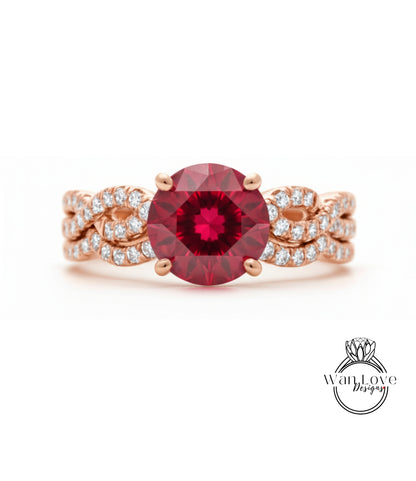 A beautiful engagement ring with a large, deep red gemstone surrounded by a delicate, intricate design of small diamonds set in a rose gold band.
