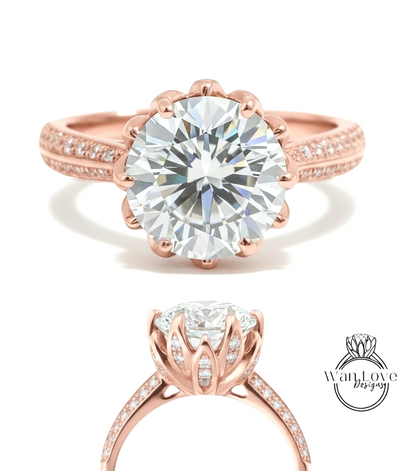 a beautiful rose gold engagement ring with a large, brilliant-cut diamond set in the center. The ring has a scalloped band and is adorned with small diamonds around the band.