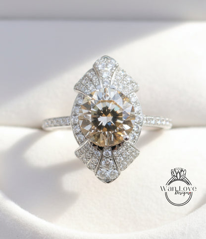 A close-up image of a diamond engagement ring with a large central diamond surrounded by smaller diamonds on either side, set in a silver band.