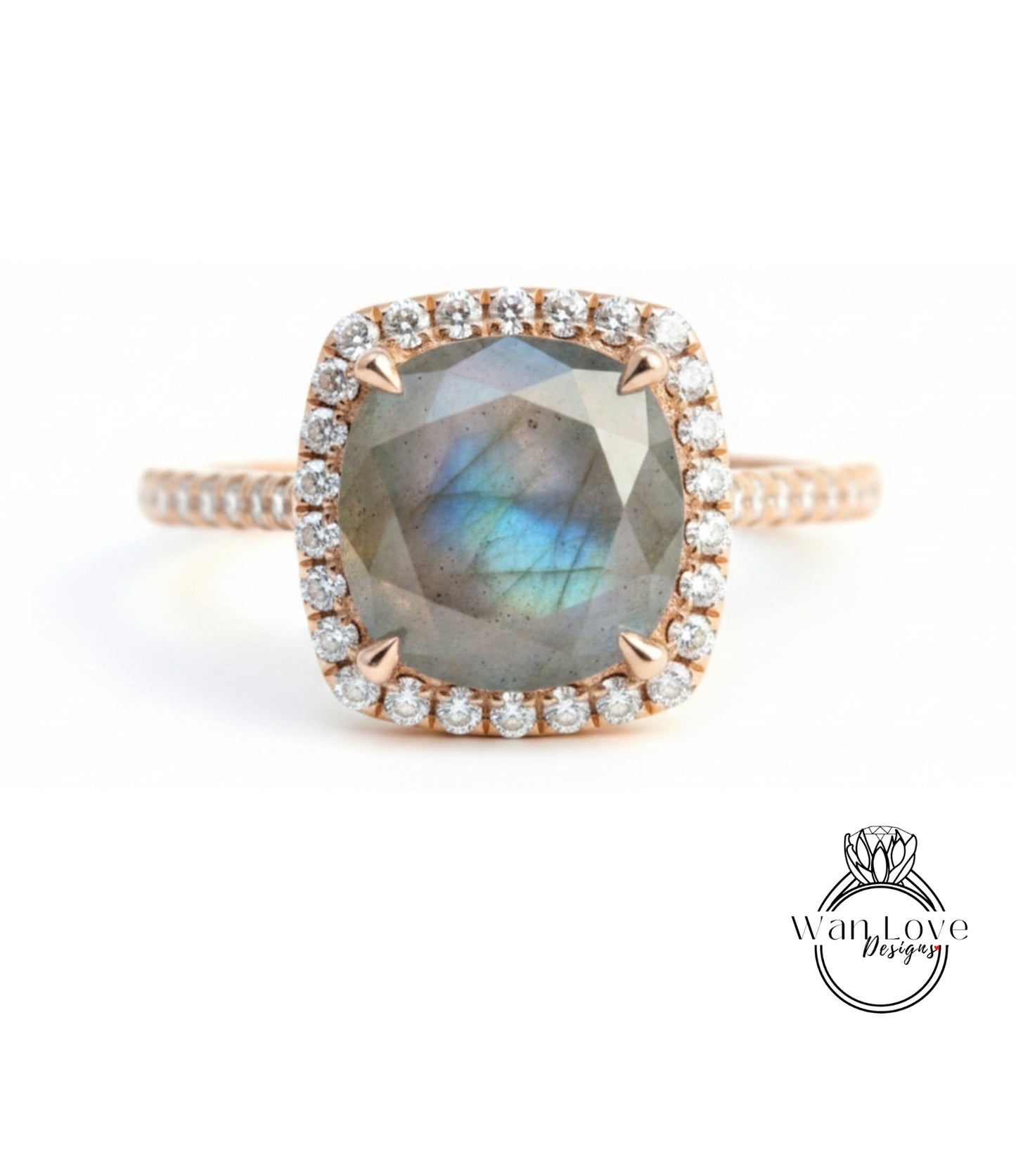 A close-up image of a beautiful engagement ring with a large, square-shaped gemstone surrounded by a halo of smaller diamonds set in a gold band.