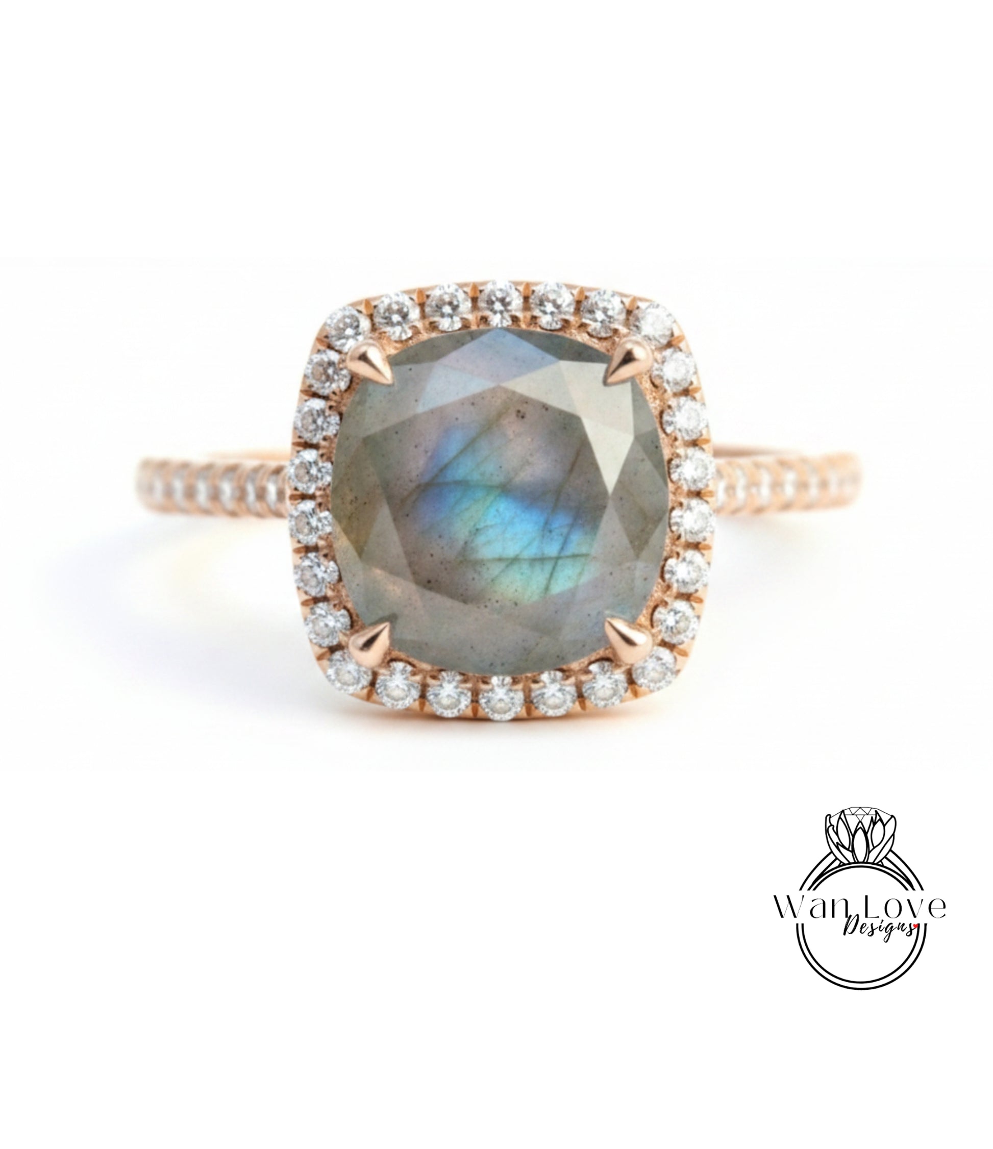 A close-up image of a beautiful engagement ring with a large, square-shaped gemstone surrounded by a halo of smaller diamonds set in a gold band.