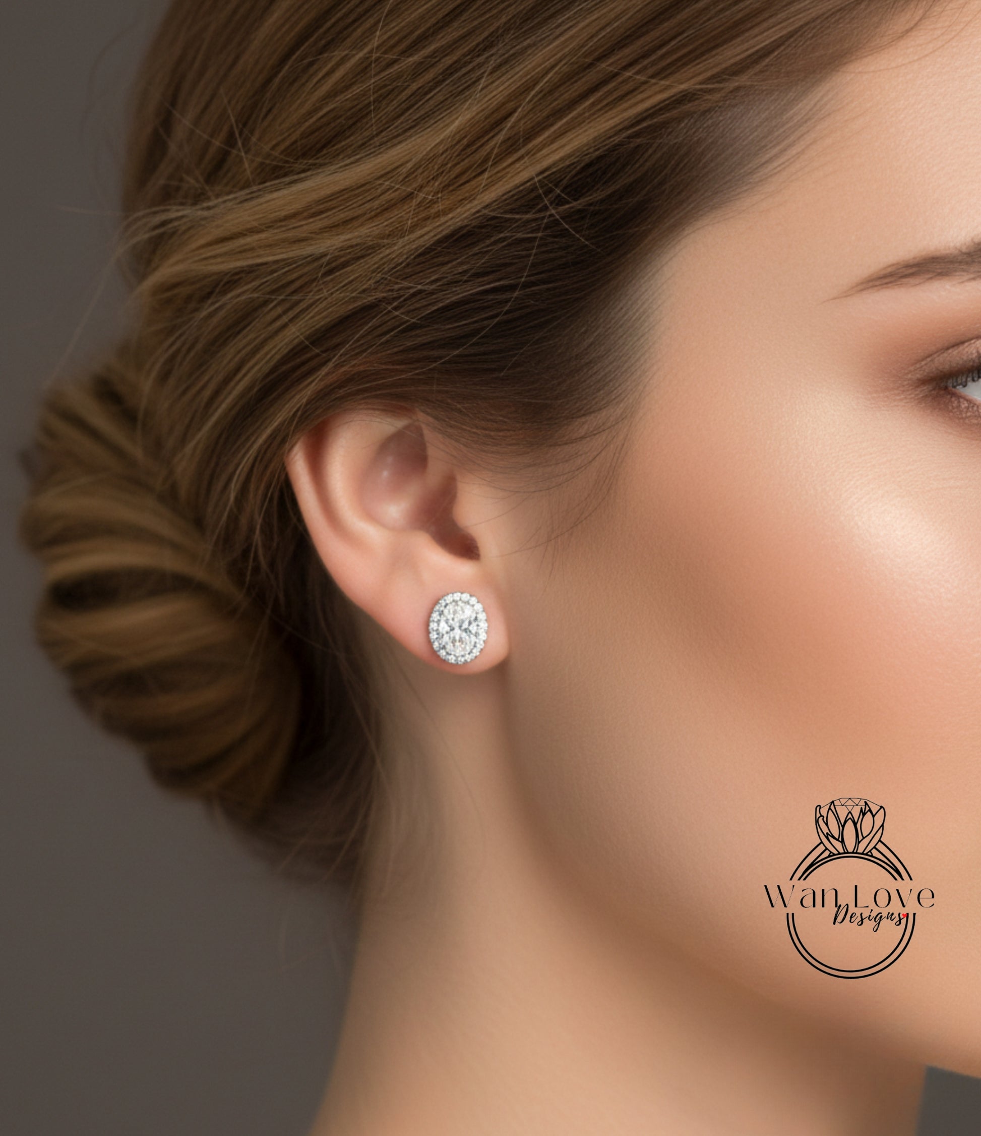 A close-up of a woman's face, focusing on her ear with a diamond earring.