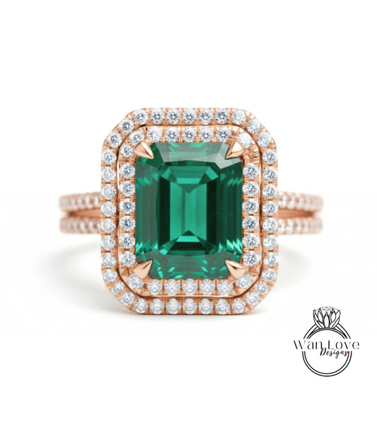 A large, green gemstone ring with a halo of smaller diamonds around it, set in a rose gold band.