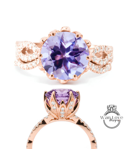a beautiful ring with a large purple gemstone set in a rose gold band. The ring has a delicate floral design around the gemstone, and the gemstone itself is a deep purple color. The image showcases the ring's intricate details and craftsmanship.