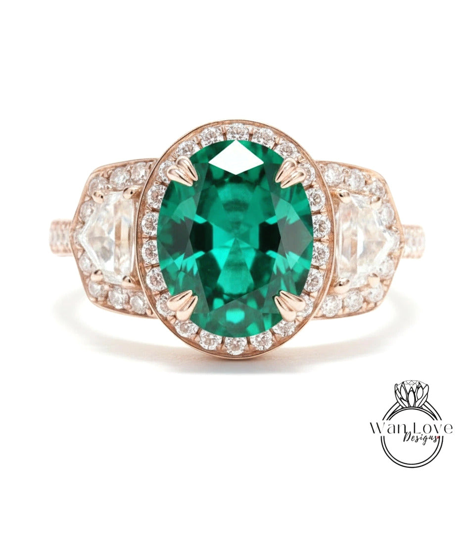 A beautiful engagement ring with a large oval-shaped green gemstone surrounded by smaller diamonds set in a rose gold band.
