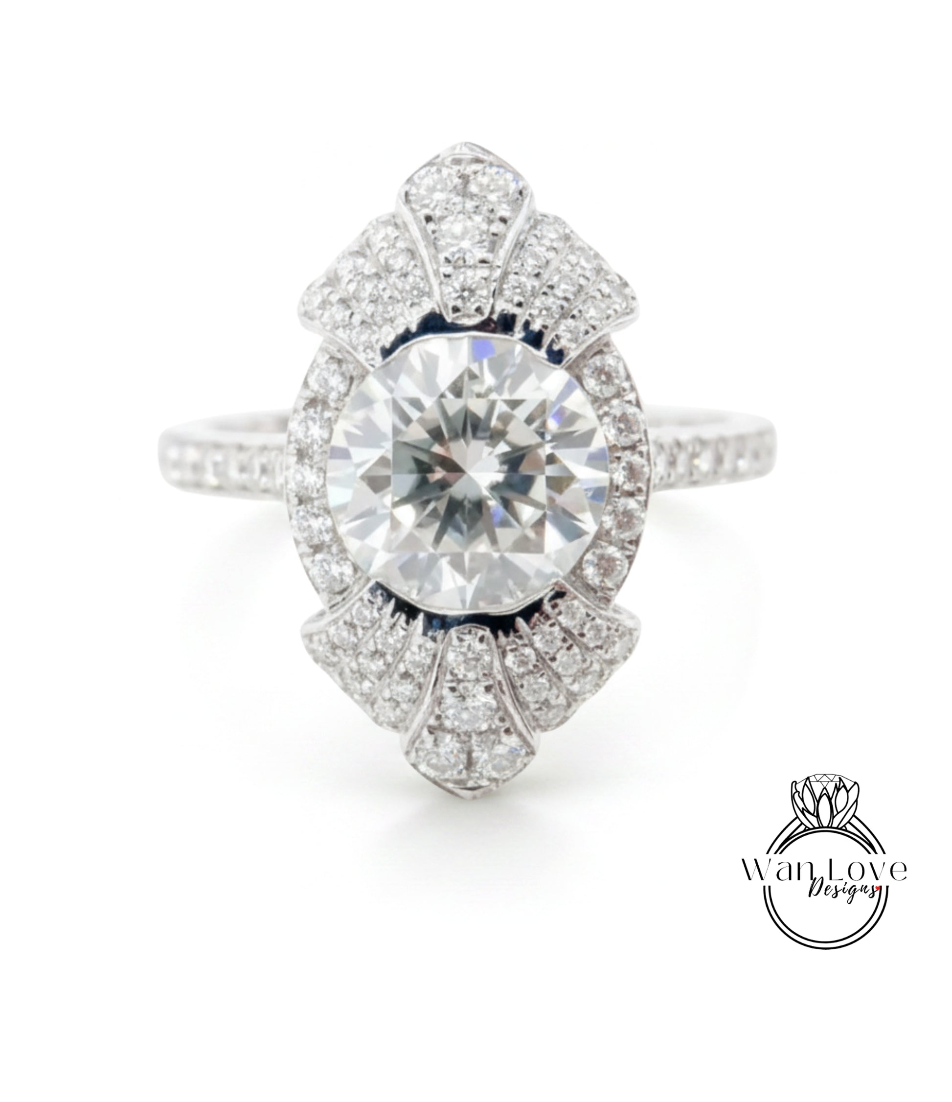 A stunning diamond engagement ring with a large central diamond surrounded by smaller diamonds set in an intricate, fan-like design.