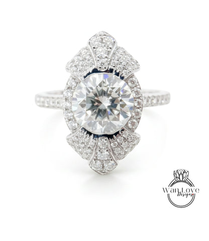 A stunning diamond engagement ring with a large central diamond surrounded by smaller diamonds set in an intricate, fan-like design.