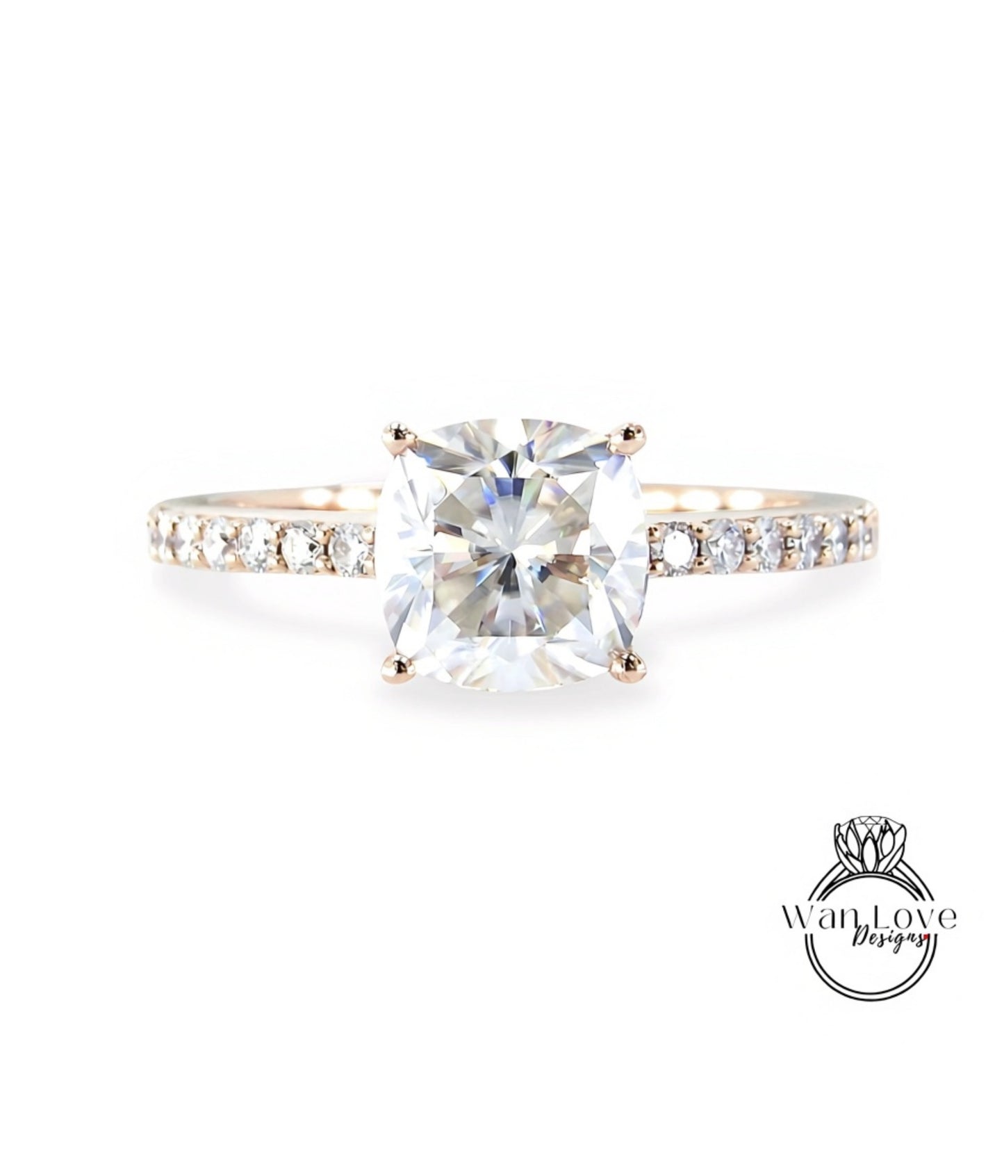 A diamond engagement ring with a large, clear gemstone set in a gold band.