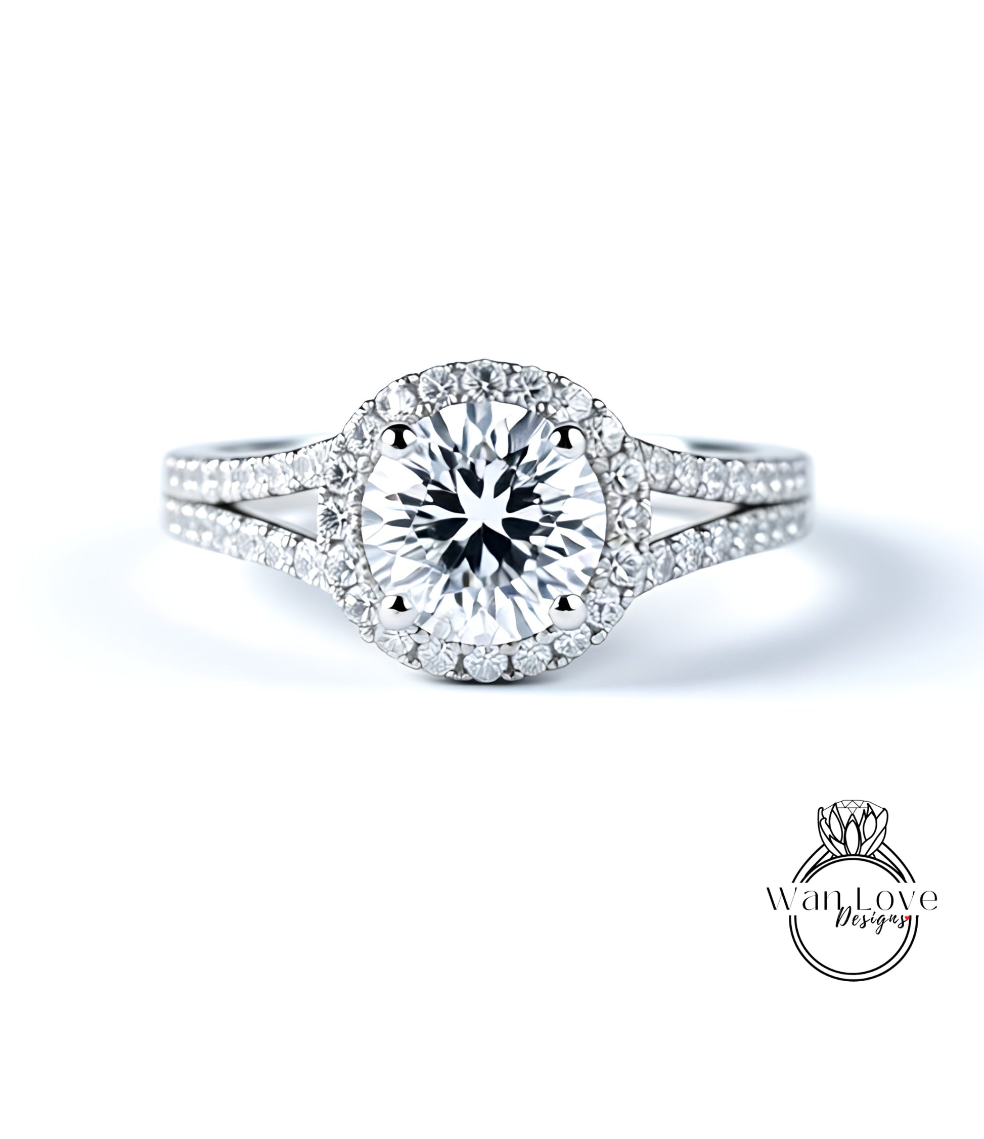 A stunning diamond engagement ring with a large central diamond surrounded by smaller diamonds set in a halo of smaller diamonds.
