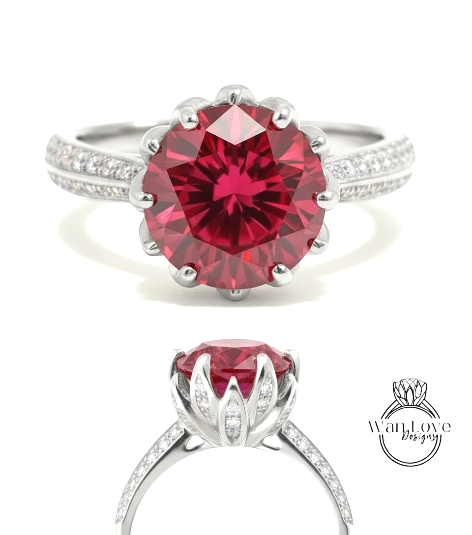 A stunning red gemstone ring with a large, round center stone surrounded by smaller diamonds. The ring is set in a silver band with a scalloped edge, and the image showcases the ring from various angles, highlighting its intricate design and vibrant color.