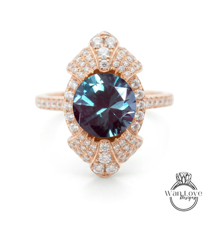 A rose gold ring with a large blue gemstone at the center, surrounded by smaller diamonds.
