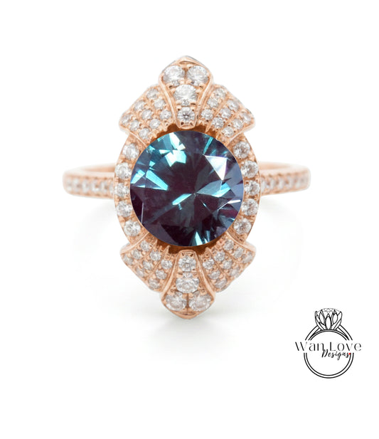 A rose gold ring with a large blue gemstone at the center, surrounded by smaller diamonds.