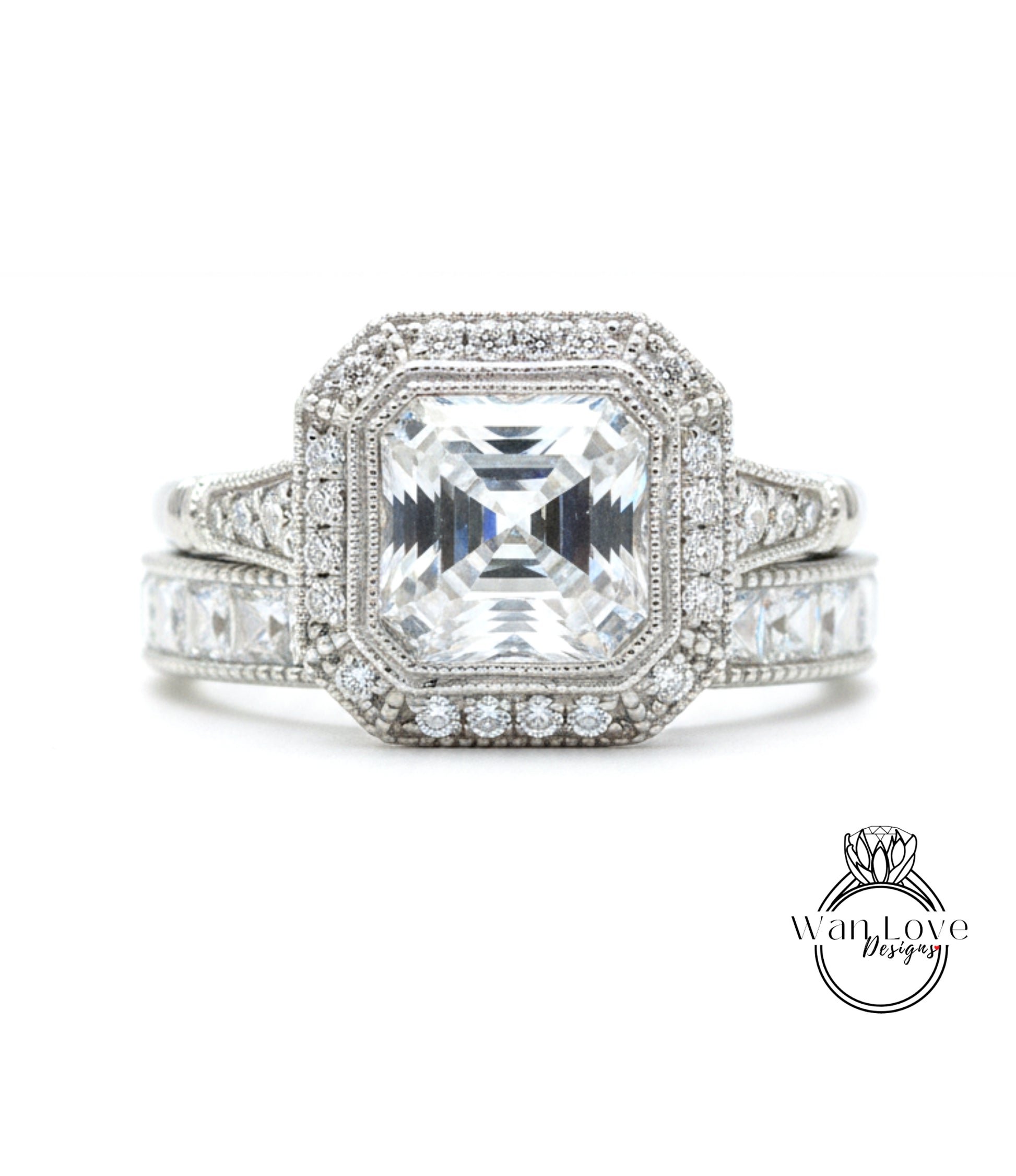 A stunning diamond engagement ring with a large central diamond surrounded by smaller diamonds and set in a halo of smaller diamonds.