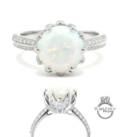 A stunning white opal engagement ring with a large central stone surrounded by smaller stones set in a silver band.
