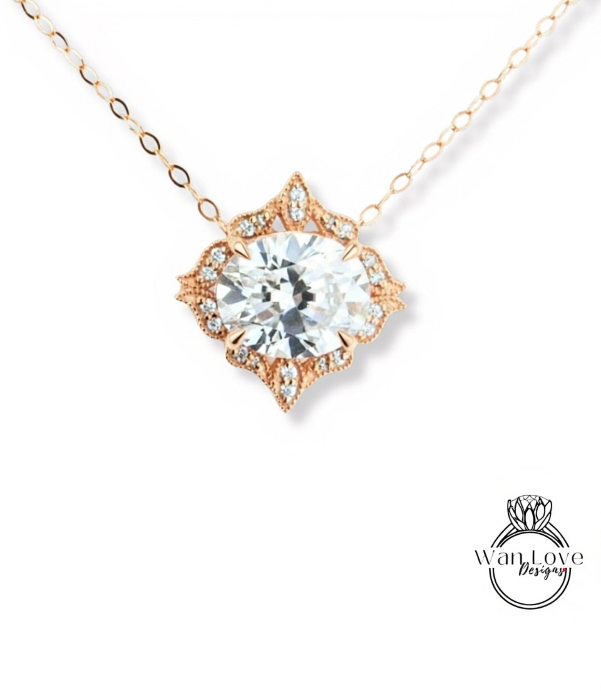 A necklace with a large, clear gemstone set in an ornate, floral-designed pendant.