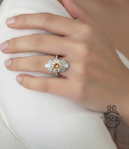 A close-up of a person's hand wearing a large, ornate diamond ring on the ring finger.
