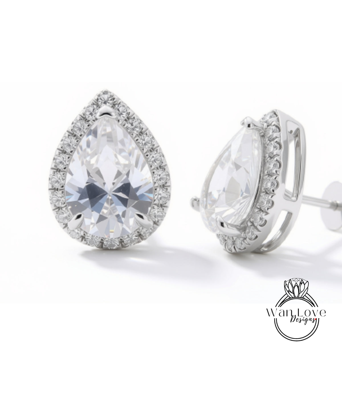 A pair of elegant earrings with a large, clear gemstone set in a halo of smaller diamonds, creating a sparkling and sophisticated design.