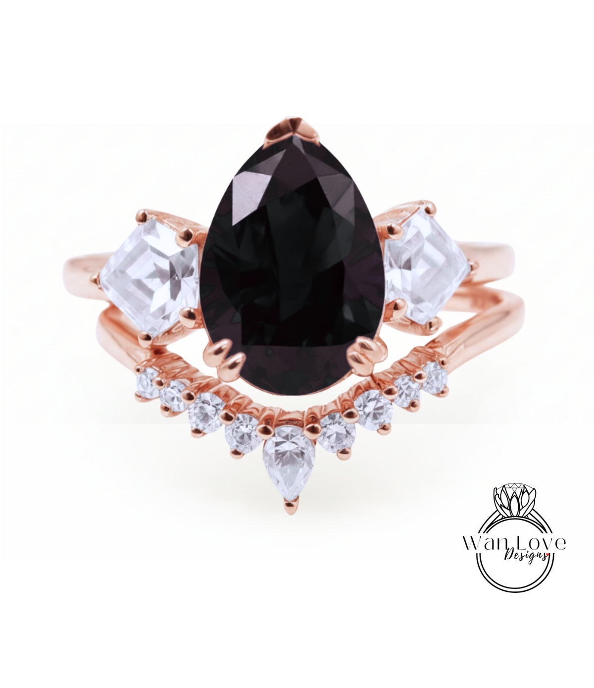 a beautiful rose gold ring with a large black gemstone at the center, surrounded by smaller clear gemstones.