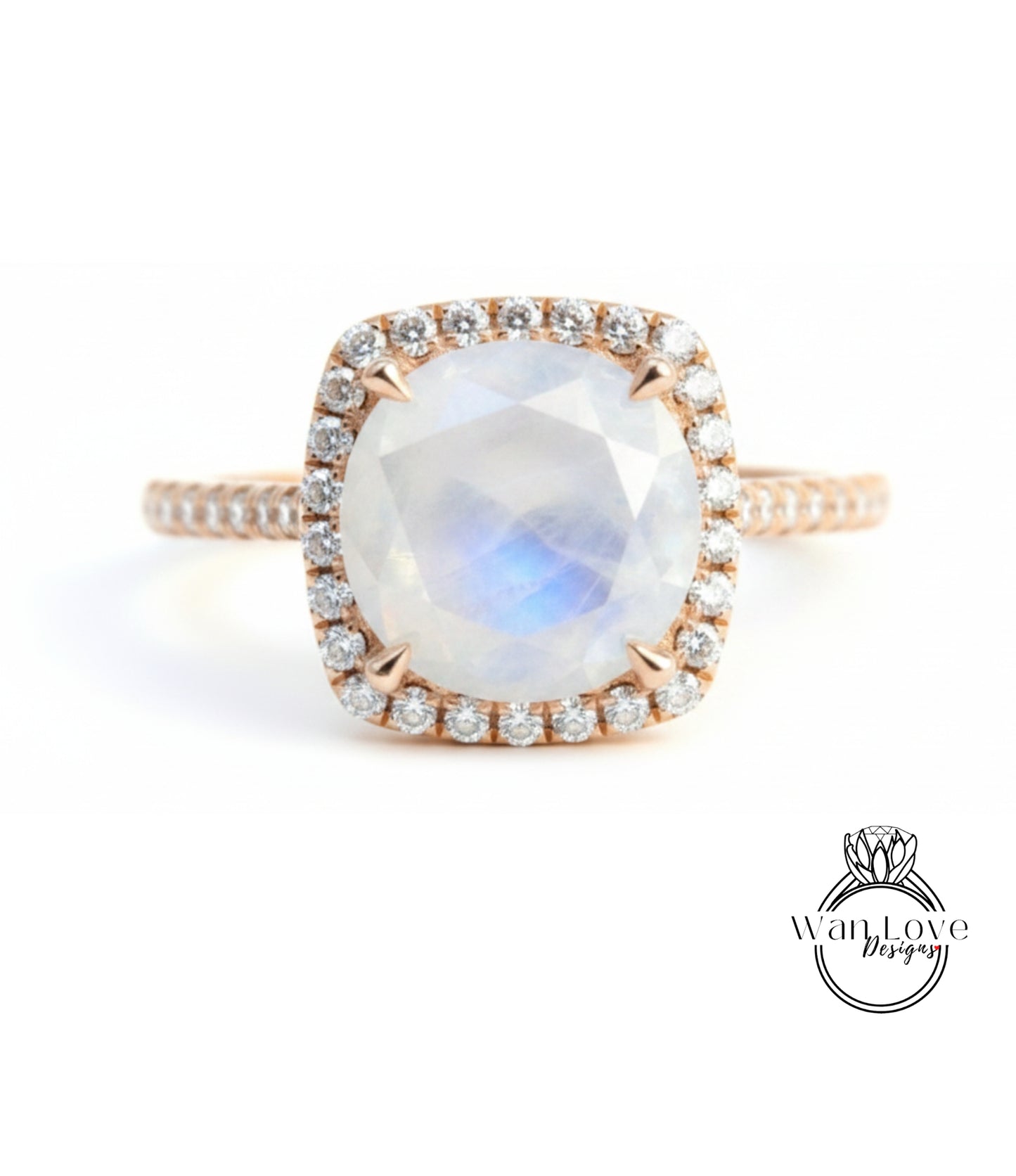 A beautiful engagement ring with a large oval-shaped gemstone surrounded by a halo of smaller diamonds.