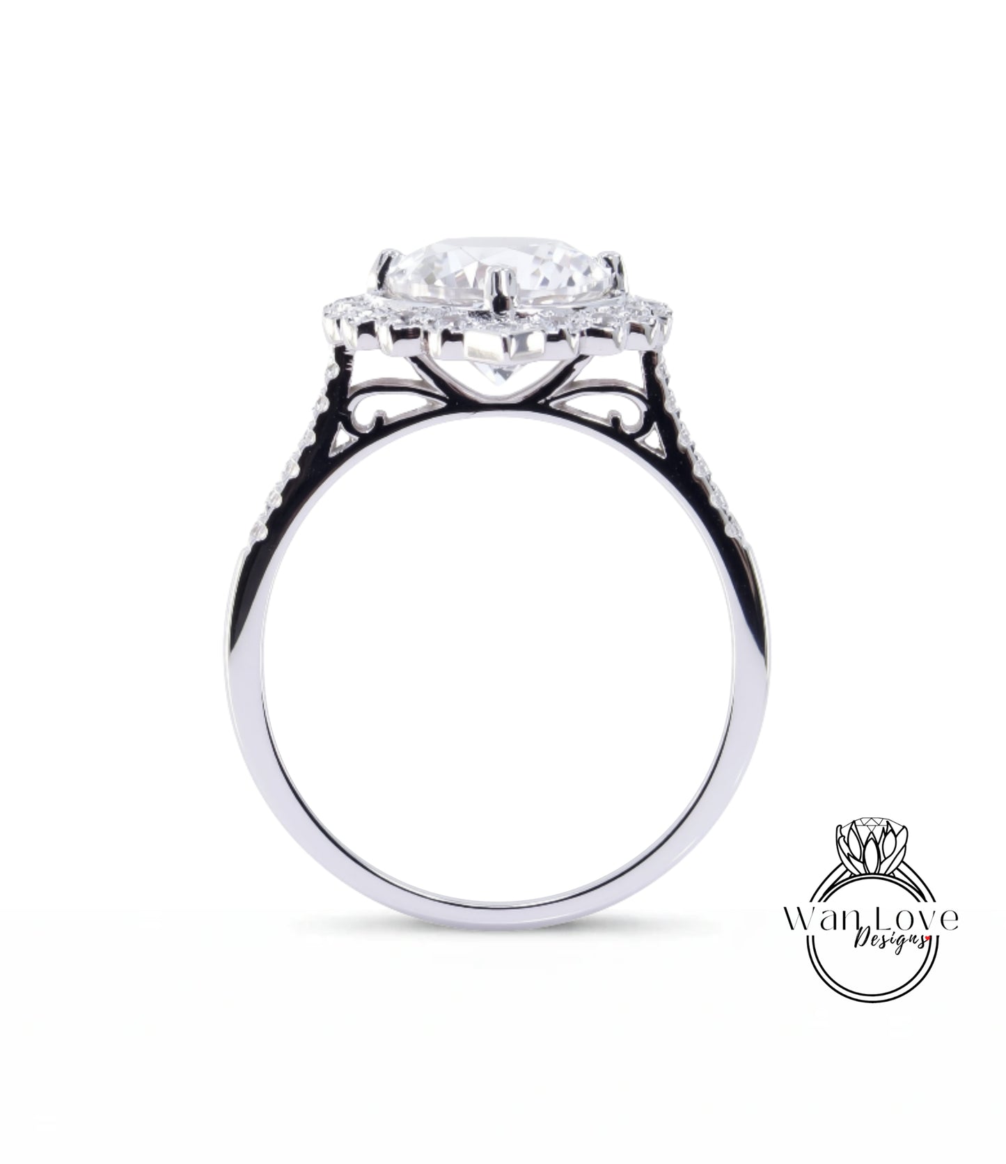 A close-up view of a silver ring with a large, round diamond at the center, surrounded by smaller diamonds.