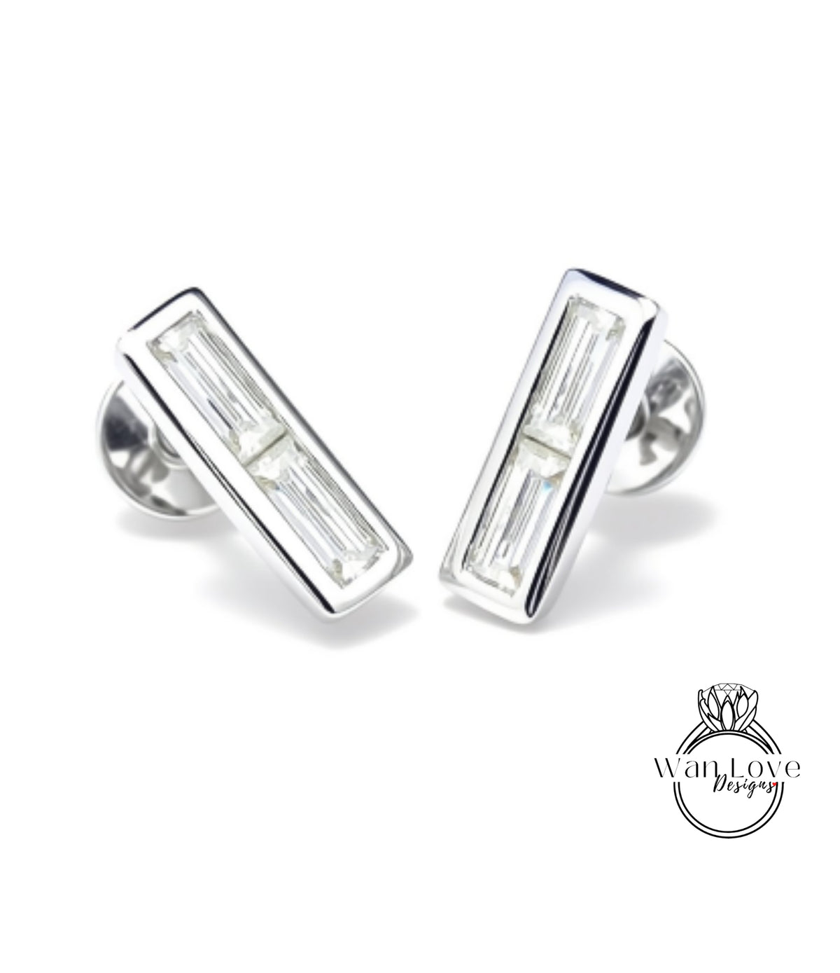 A pair of silver earrings with rectangular cut gemstones.