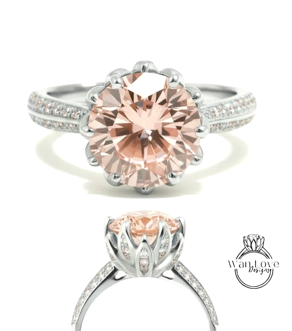 A stunning engagement ring featuring a large, round, peach-colored gemstone set in a silver band adorned with small diamonds.