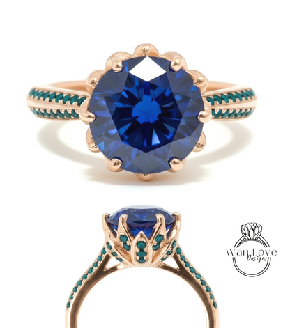 a stunning blue gemstone ring with a gold band and a delicate floral design. The ring is adorned with a large blue gemstone at the center, surrounded by smaller blue gemstones that create a beautiful contrast. The ring is set in a gold band, which complements the blue gemstone and adds to its elegance. The image showcases the ring from two different angles, providing a comprehensive view of its design and craftsmanship.