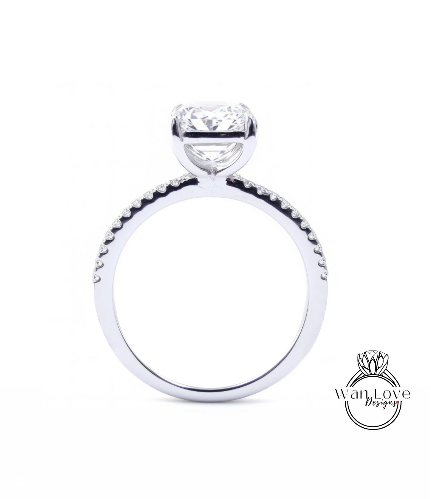 A close-up view of a diamond engagement ring with a large central diamond and smaller diamonds along the band.